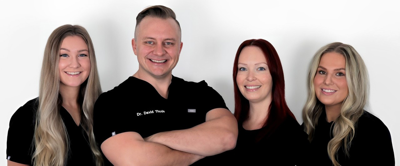 Our dentist in Victoria, BC, with his dental team